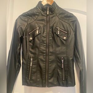 Women’s black faux leather jacket with silver zippers in size XS